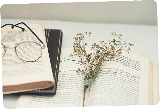 Open book with glasses